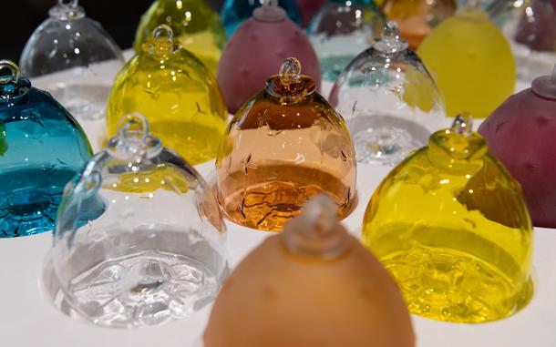 Glass objects on a white table.