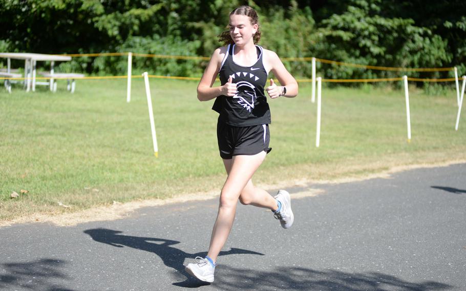 Hailey Erler runs on the course.