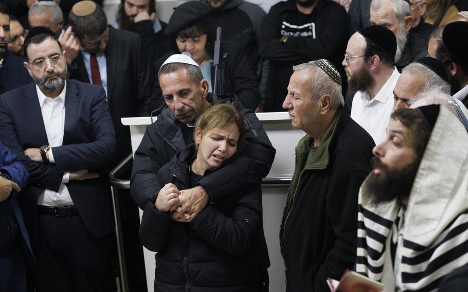 Mourners attend a funeral for Eli and Natalie Mizrahi on Jan. 29, 2023, in Beit Shemesh, Israel, after the married couple were killed in a shooting by a Palestinian gunman in East Jerusalem. 