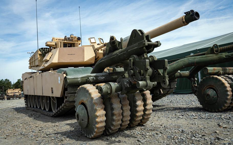 An M1A1 Abrams tank with an attached mine roller at Grafenwoehr Training Area, Germany, on July 14, 2023.