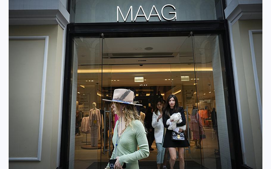 A woman exits a newly opened Maag store, a former Zara flagship store, in Moscow, Russia, on April 27, 2023. 