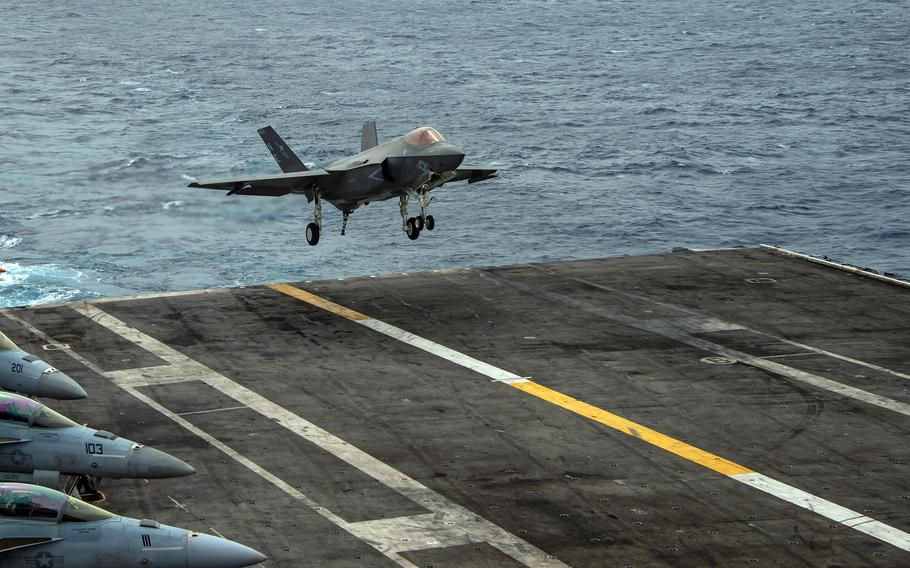An F-35C Lightning II stealth fighter lands on the flight deck of the USS Carl Vinson in the South China Sea, Jan. 13, 2022.