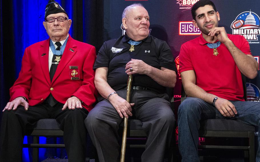 Medal of Honor recipients Hershel “Woody” Williams, Kenneth Stumpf and Florent Groberg, left to right, represent three generations of heroes at a reception before the Military Bowl at Annapolis, Md., Dec. 28, 2015.