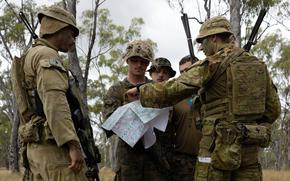 U.S. Marines and Australian troops plan movements during the Southern Jackaroo exercise at Townsville Field Training Area in Queensland, Australia, on May 25, 2024.