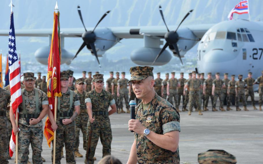 Brig. Gen. George Rowell, assistant wing commander of 1st Marine Aircraft Wing, speaks during the activation ceremony for Marine Aerial Refueler Transport Squadron 153 at Marine Corps Base Hawaii, Friday, Jan. 13, 2023.