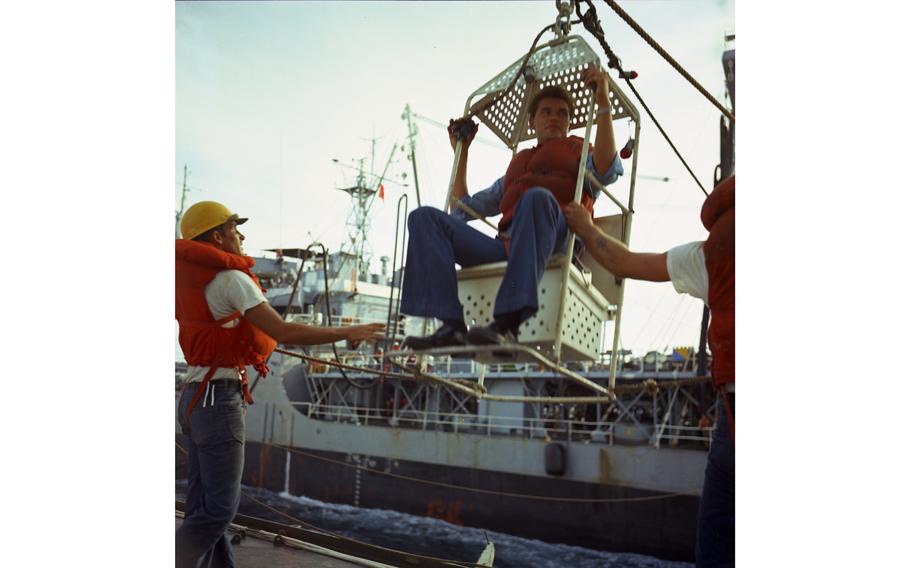 Transfer of personnel by high-lines onto the USS Buchanan from the tanker USS Tappahannock. The U.S naval ships were taking part in Operation Sea Dragon, conducting naval bombardments at targets north of Dong Hoi, North Vietnam.