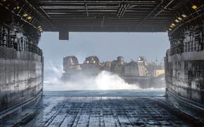 A landing craft air cushion leaves the well deck of the amphibious transport dock ship USS Green Bay during training in the Gulf of Thailand, Feb. 28, 2022. 
