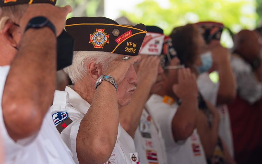 Thousands of benefits claims from Navy veterans who served during the Vietnam War were overlooked for more than a year when they should have been forwarded for a decision, according to a new report by the Office of Inspector General at the Department of Veterans Affairs. In this 2022 photo, Navy veterans salute during a Vietnam War Veterans Day ceremony at the National Memorial Cemetery of the Pacific in Hawaii.