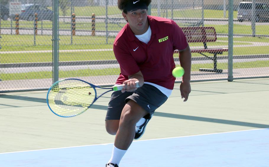 Matthew C. Perry's Jayden Santiago readies a forehand return during Saturday's matches with E.J. King. Santiago teamed with Jalen Cobb to beat the Cobras' Christian Garcia and Jacob Ferrer 8-6.