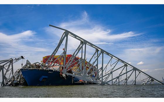 Salvage efforts continue as workers make preparations to remove the wreckage of the Francis Scott Key Bridge from the container ship Dali five weeks after the catastrophic collapse. (Jerry Jackson/The Baltimore Sun/TNS)