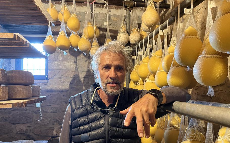 Mario Borraro with his caciocavallo cheese at his family-run cheese factory, Azienda Agricola Carmela Colavecchio. He has won a national competition for the cheese.
