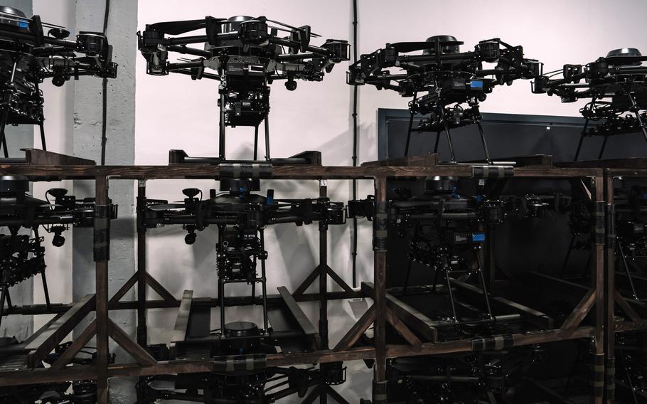 A collection of drones on a shelf.