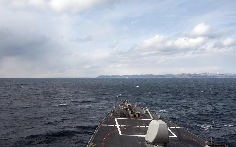 The guided-missile destroyer USS Benfold sails through the Tsugaru Strait near Hokkaido, Japan, in February 2016. 