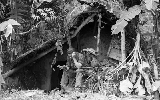 Que Son Valley Vietnam, Jan. 20, 1968: 1st Cavalryman catches up on his reading as he awaits transport back to  landing Zone Ross.

Looking for Stars and Stripes’ coverage of the Vietnam War? Subscribe to Stars and Stripes’ historic newspaper archive! We have digitized our 1948-1999 European and Pacific editions, as well as several of our WWII editions and made them available online through https://starsandstripes.newspaperarchive.com/

META TAGS: Vietnam; Vietnam War; combat; cavalry; 1st Cavalry; 1st Cav; Army; patrol; leisure; way of life; servicemember