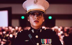 Marine Corps 1st. Lt. Amanda Toledo serves as sword detail during a birthday ball ceremony in San Diego, Nov. 10, 2023. 