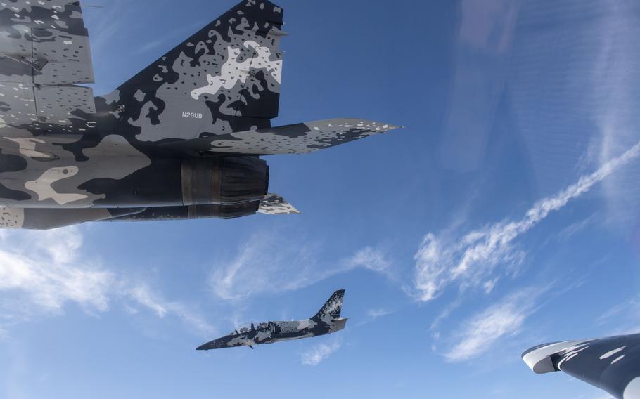 Polaris Dawn Mission Commander Jared Isaacman flies a MiG fighter (L) in formation with pilot Terry Scott in the L-39 and mission pilot Scott Poteet who is flying a Dassault/Dornier Alpha Jet as the flight crew performs fighter jet training. 