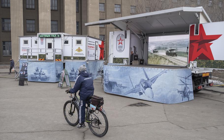 A mobile military draft office, with banners, video clips on a screen and music to promote enlistment in the Russian army in the center of Volgograd on Feb. 2, 2023.