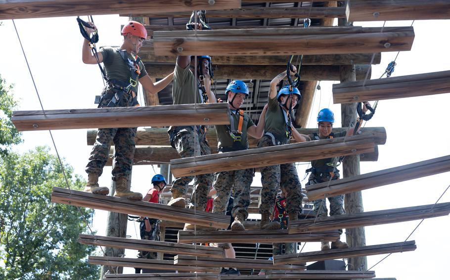 Marines participate in the confidence course.