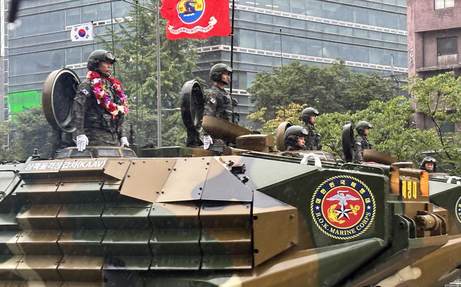 South Korean marines ride through Seoul on amphibious assault vehicles during the Armed Forces Day parade, Tuesday, Sept. 26. 2023. 