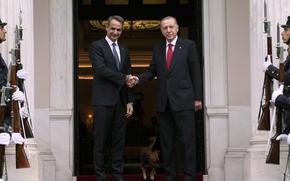 Greece's Prime Minister Kyriakos Mitsotakis, left, welcomes the Turkey's President Recep Tayyip Erdogan before their meeting at Maximos Mansion in Athens, Greece, Thursday, Dec. 7, 2023. Old foes Turkey and Greece will test a five-month-old friendship initiative on Monday, May 13, 2024 when Greek Prime Minister Kyriakos Mitsotakis visits Ankara.