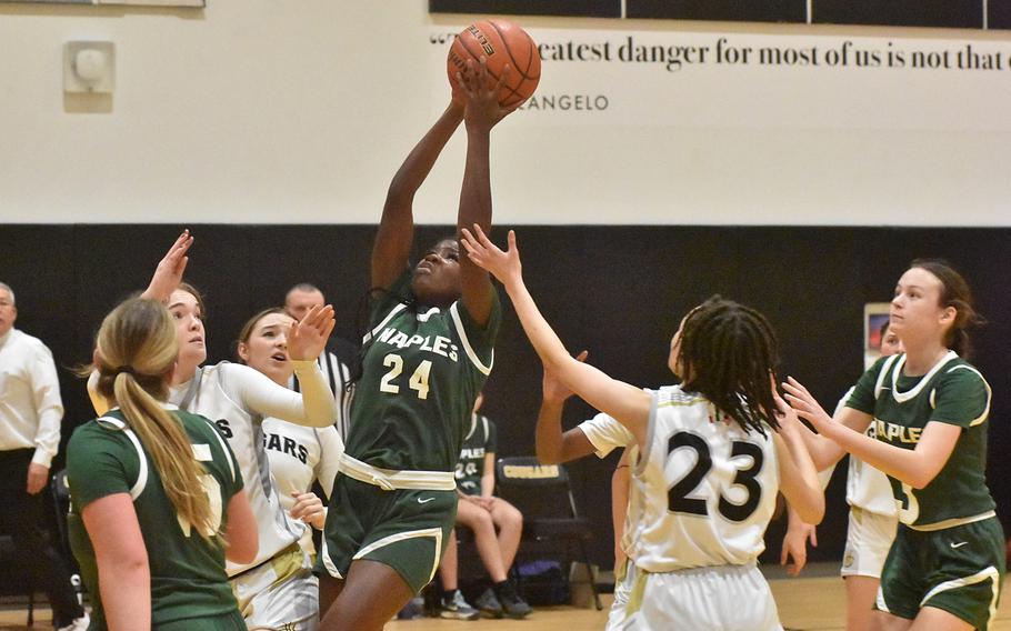 Naples’ VaNae Filer tries to score against Vicenza on Friday, Feb. 2, 2024, in the Wildcats’ 34-32 victory over the Cougars. Filer had game highs of 16 points and 12 rebounds.