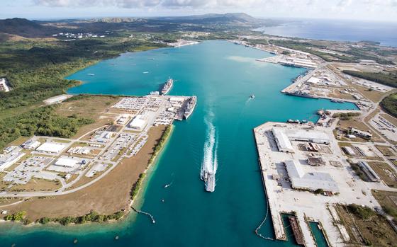 An aerial view of U.S. Naval Base Guam shows several vessels moored in Apra Harbor, March 15, 2018.