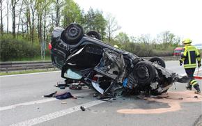 An overturned vehicle lies amid debris on highway A72 near Plauen, Germany, after a crash May 22, 2023. U.S. soldiers assigned to the 2nd Cavalry Regiment assisted the crash victims after the multi-car collision injured at least four people.
