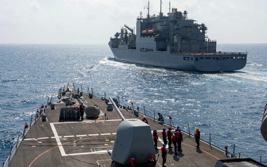 Guided-missile destroyer USS Paul Hamilton approaches dry cargo and ammunition ship USNS Alan Shepard during a replenishment-at-sea, April 16, 2023, in the Arabian Sea.