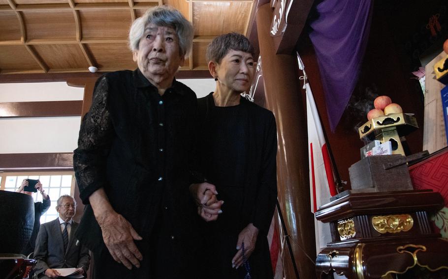 A former Japanese intelligence officer attends a ceremony honoring U.S. bomber crews from World War II.