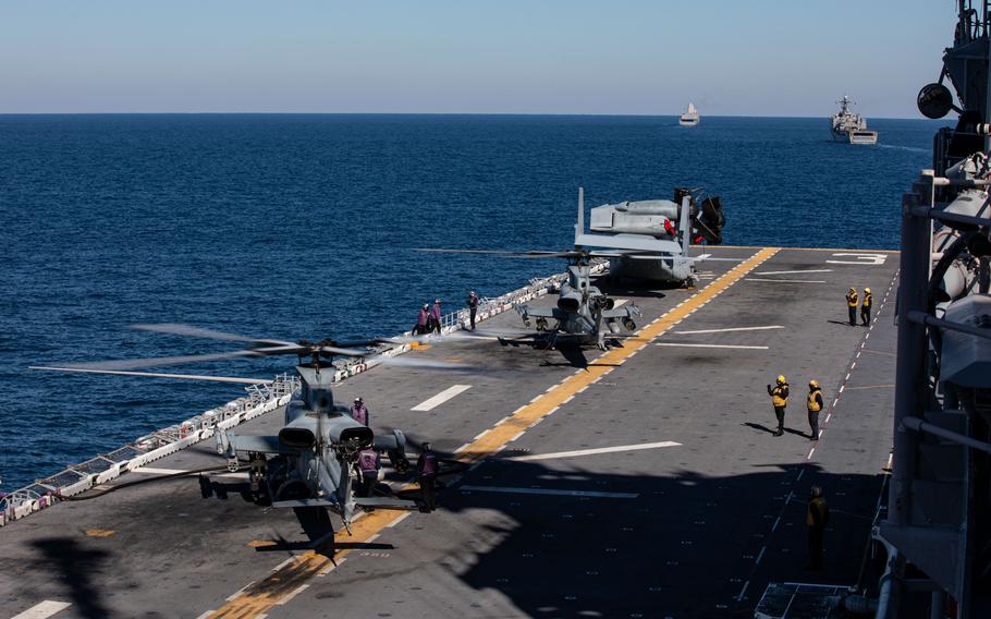 U.S. Navy sailors refuel UH-1Y Cobras during Composite Training Unit Exercise (COMPTUEX) aboard the USS Kearsarge (LHD 3), Jan. 24, 2022. The 22nd MEU and Amphibious Squadron (PHIBRON) Six are underway for COMPTUEX in preparation for an upcoming deployment.