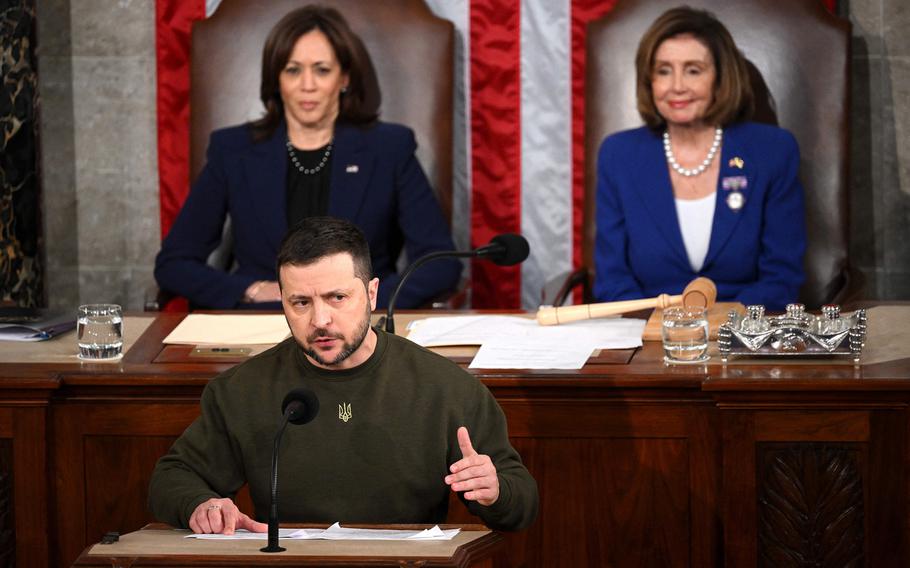 Ukrainian President Volodymyr Zelensky addresses the U.S. Congress flanked by Vice President Kamala Harris, left, and U.S. House Speaker Nancy Pelosi (D-CA) at the U.S. Capitol in Washington, D.C., on Dec. 21, 2022. 