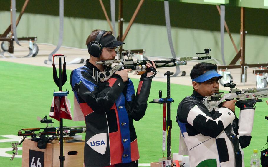 Lucas Kozeniesky shoots for Team USA in a Tokyo Olympics 10-meter air rifle event at Asaka Shooting Range at Camp Asaka, Japan, Saturday, July 24, 2021.