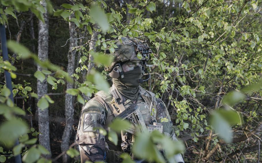 A French paratrooper participates in training in Estonia. 