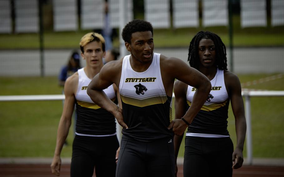 Boys 100-meter runners Tymir Johnson, from left, Alex Guthrie, and Daniel Greer walk after the race at the 2024 DODEA European Championships at Kaiserslautern High School in Kaiserslautern, Germany, on May 24, 2024. Guthrie won with a time of 10.92 seconds.
