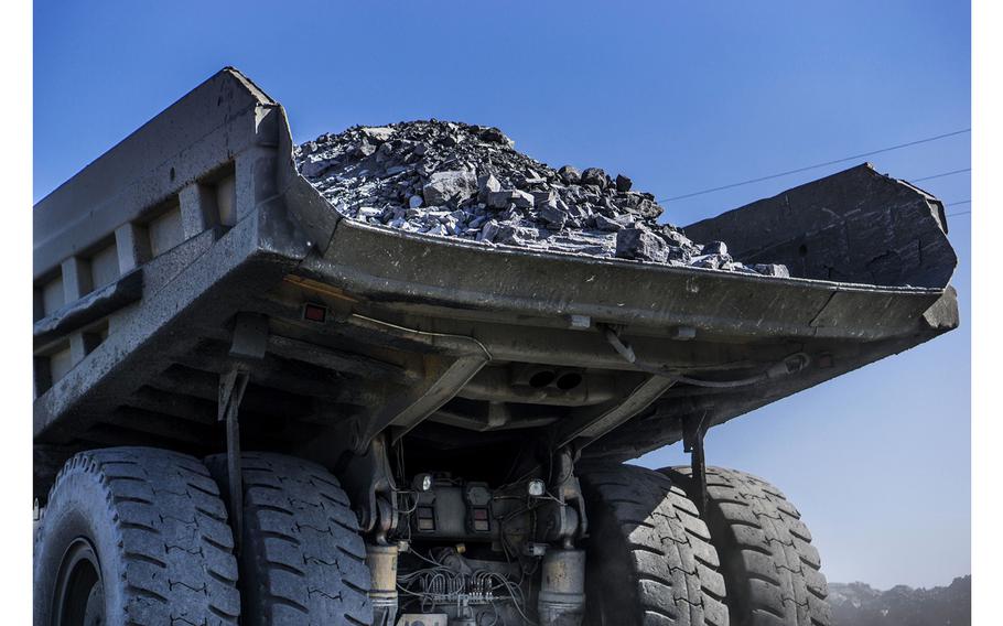 A truck loaded with excavated iron ore rock exits the Yeristovo and Poltava iron ore mine in Poltava, Ukraine, on May 5, 2017. 