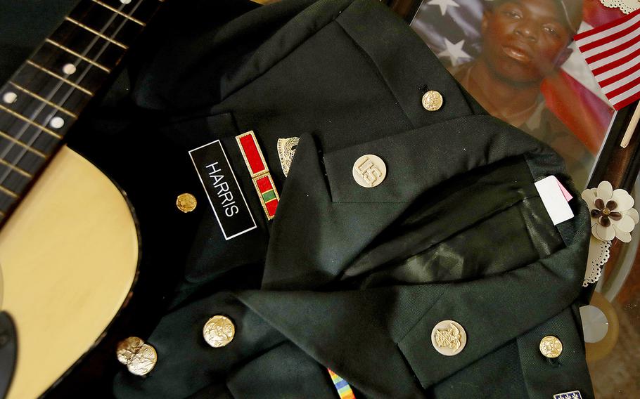 Mementos kept by the parents of Leroy Harris III, include his dress uniform jacket, his guitar and pictures from his days in the military. A soldier in the U.S. Army, Leroy Harris III was killed in action in 2004 in Iraq. 