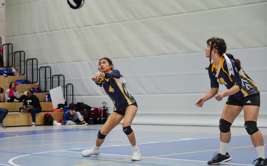 Kylah Tuazon sets the ball during the 2022 DODEA-Europe Volleyball Tournament Division III Championship game against the Sigonella Jaguars, Oct. 29, 2022, at Ramstein Air Base, Germany.