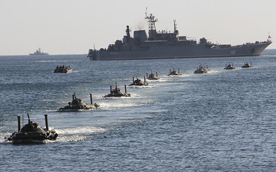 Russian Black Sea Fleet landing craft approach Crimea during an exercise Sept. 11, 2012, about two years before Russia took the peninsula from Ukraine. Russia now has launched an amphibious assault along Ukraine's eastern shore, a senior U.S. defense official said Feb. 25, 2022.
