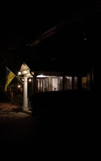 A Ukrainian flag hangs from the front porch of the Philadelphia home of Kateryna and Michael Tulio. 