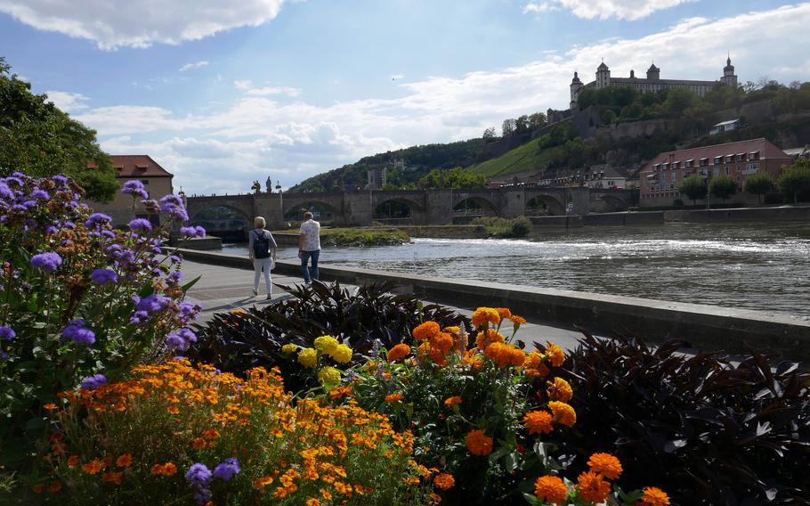The promenade along the Main River gets you out of the hustle and bustle of Wuerzburg, Germany’s city center. In the background is the old stone bridge and atop the hill at right, Fortress Marienberg.
