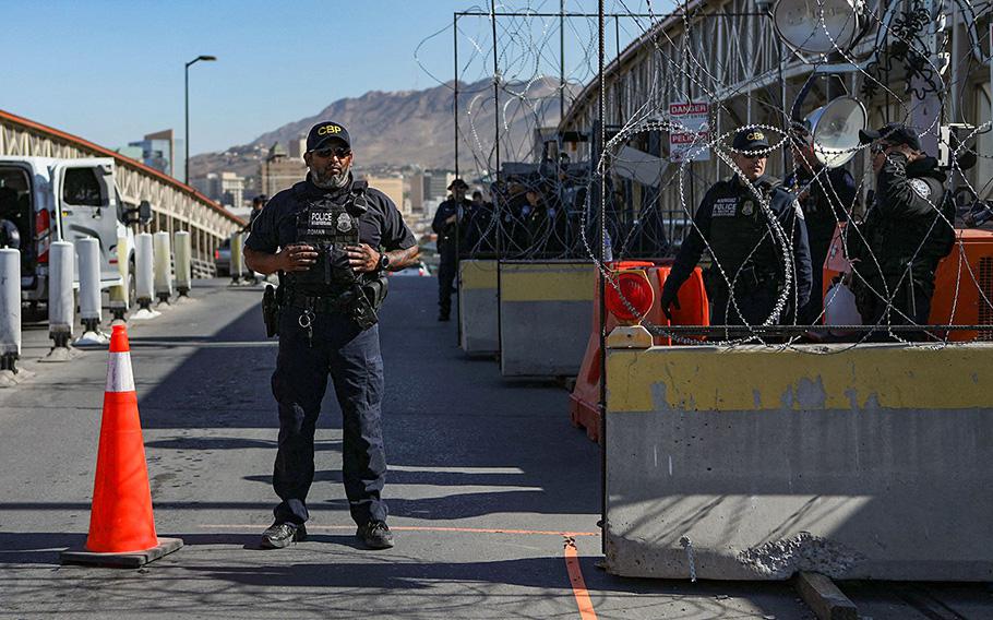 US Customs and Border Protection agents guard the Paso del Norte - Santa Fe International Bridge in Ciudad Juarez, Chihuahua state, Mexico on May 12, 2023.