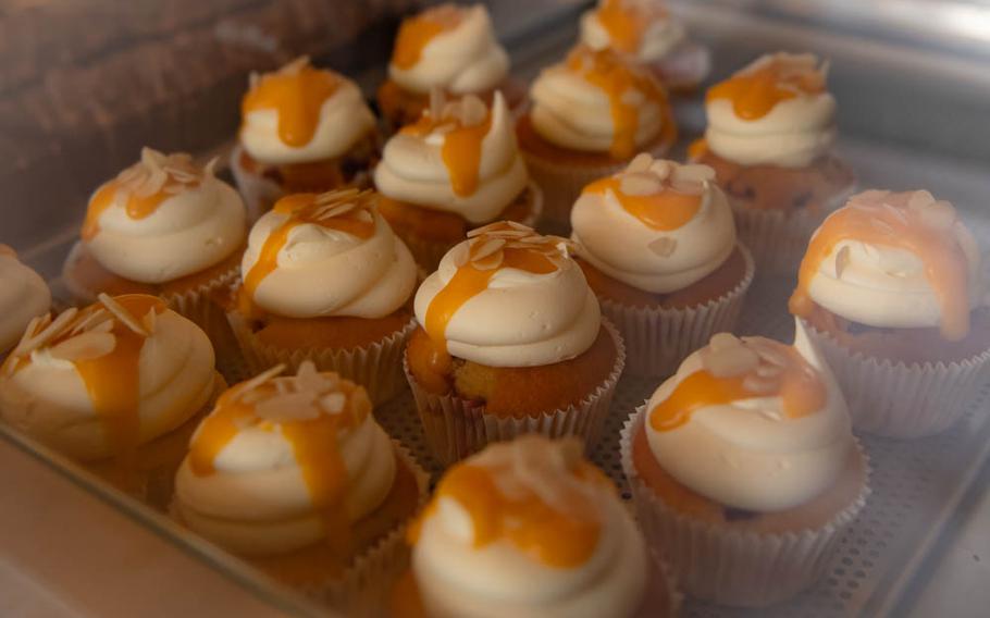 Fresh fruit cupcakes are on display at The Parlour breakfast boutique in Landstuhl, Germany, June 16, 2023.