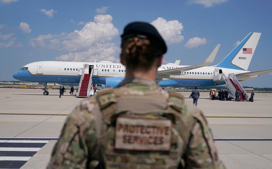 A member of the Air Force stands guard near Air Force Two at Andrews Air Force Base, Md., on June 6, 2021.