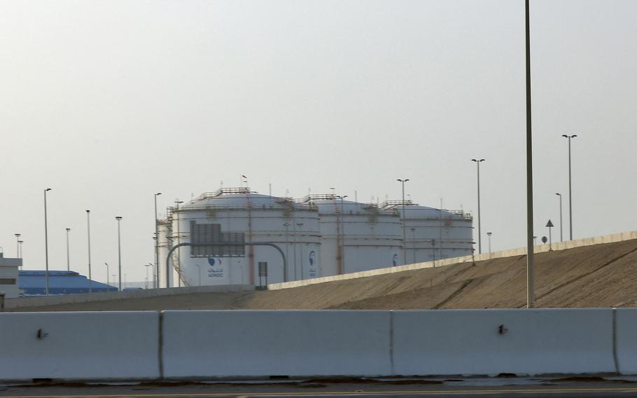 A storage facility of oil giant ADNOC near the airport in the capital of the United Arab Emirates, Abu Dhabi, on Monday, Jan. 17, 2022. Three people were killed in a suspected drone attack that set off a blast and a fire in Abu Dhabi, officials said, as Yemen's rebels announced military operations in the United Arab Emirates.