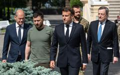 Ukrainian President Volodymyr Zelenskyy, France's President Emmanuel Macron, German Chancellor Olaf Scholz, and Italian Prime Minister Mario Draghi walk to the news conference area on June 16, 2022, in Kyiv, Ukraine. The leaders made their first visits to Ukraine since the country was invaded by Russia on February 24th. (Alexey Furman/Getty Images/TNS)