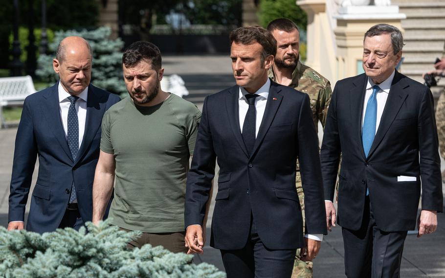 Ukrainian President Volodymyr Zelenskyy, France’s President Emmanuel Macron, German Chancellor Olaf Scholz, and Italian Prime Minister Mario Draghi walk to the news conference area on June 16, 2022, in Kyiv, Ukraine. The leaders made their first visits to Ukraine since the country was invaded by Russia on Feb. 24.