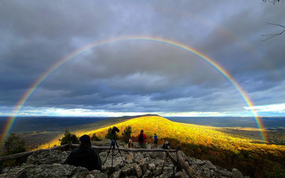 Official bird counters are treated to a rainbow last year at Hawk Mountain Sanctuary’s North Lookout in Pennsylvania. 