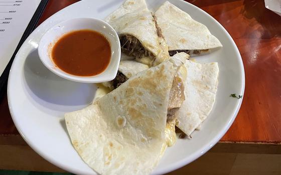 The Quesabirria De Res from Gran Aztecas in Yokosuka, Japan, is cheesy and beefy and comes with a spicy dipping sauce. 