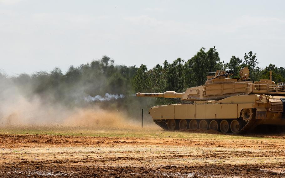 A U.S. Army M1A2 SEP V3 Abrams Main Battle Tank named “Death Trap” fires its main gun — a 120mm smooth bore cannon — during a demonstration of combined armed tactics at Fort Benning, Ga., on March 24, 2022, during the African Land Forces Summit.
