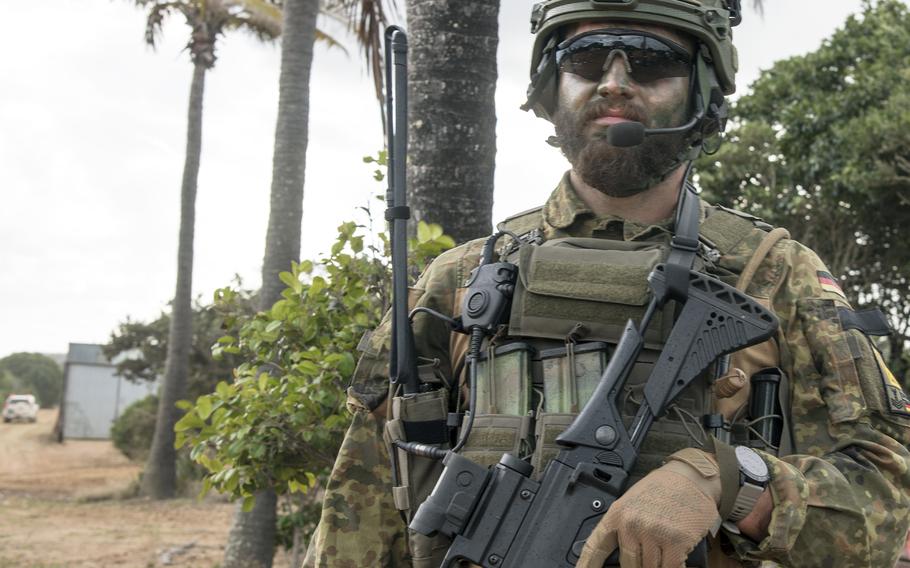 Staff Sgt. Jakob Tedsen, a German sailor, poses during a Talisman Sabre drill near Stanage Bay, Australia, Wednesday, Aug. 2, 2023. 